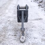 Front view of the frost ripper showing the shank width, mounting ears and pin bosses