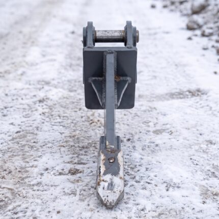 Front view of the frost ripper showing the shank width, mounting ears and pin bosses