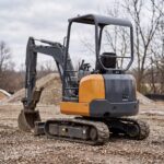 MX-17 mini excavator from the rear showing the counterweight and engine hood