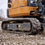 Close-up of the MX-17 rubber track, idler wheel and track rollers