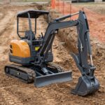 MX-25 2.5 ton mini excavator on churned earth at a utility trenching site
